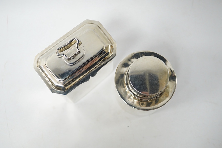 A George V silver octagonal tea caddy, by Carrington & Co, London, 1917, height 9cm, together with an earlier silver circular tea caddy, Birmingham, 1909, 9oz. Condition - fair and good